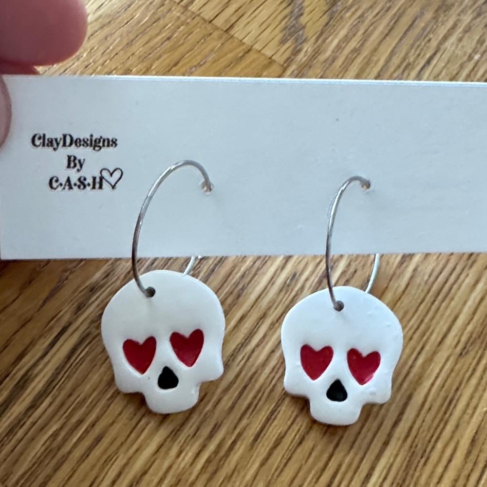 White Skull Earrings with Red Heart Eyes